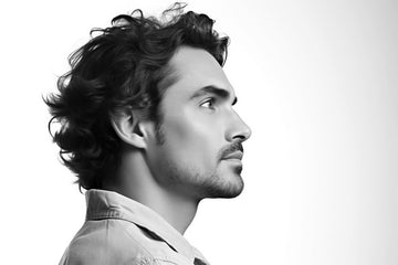 Profile view of a man showcasing how to get wavy hair for men