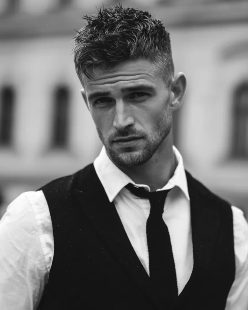 2mm beard with light stubble on a man with short textured hair and a natural neckline