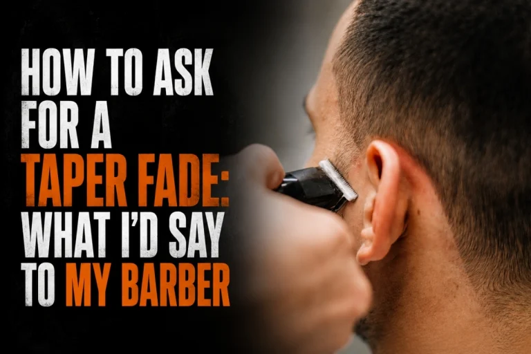 Barber creating a taper fade around a man's temple and ear.
