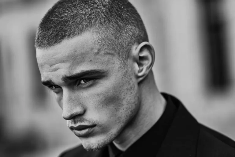 professional buzz cut with fade, black and white close-up portrait