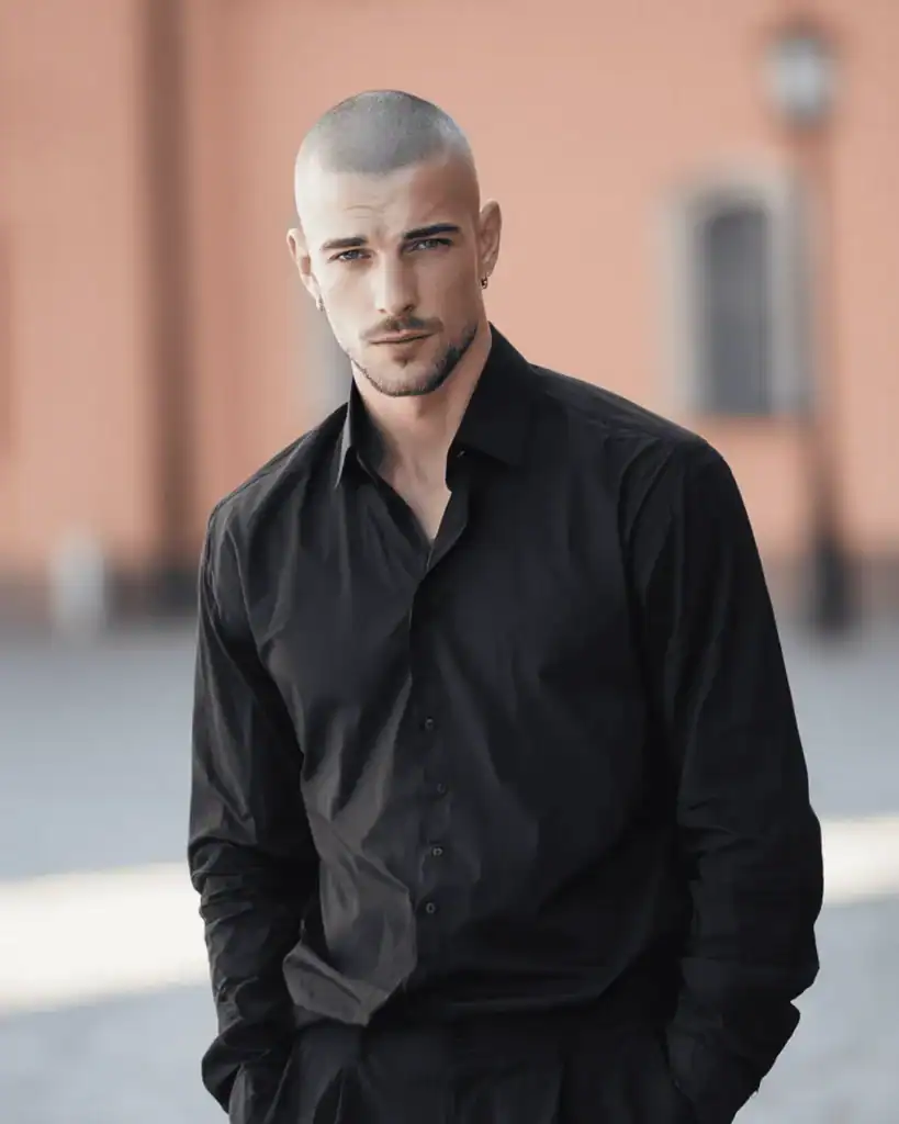 Model with a 3mm haircut (Grade 1 buzz cut) showing the visible scalp texture