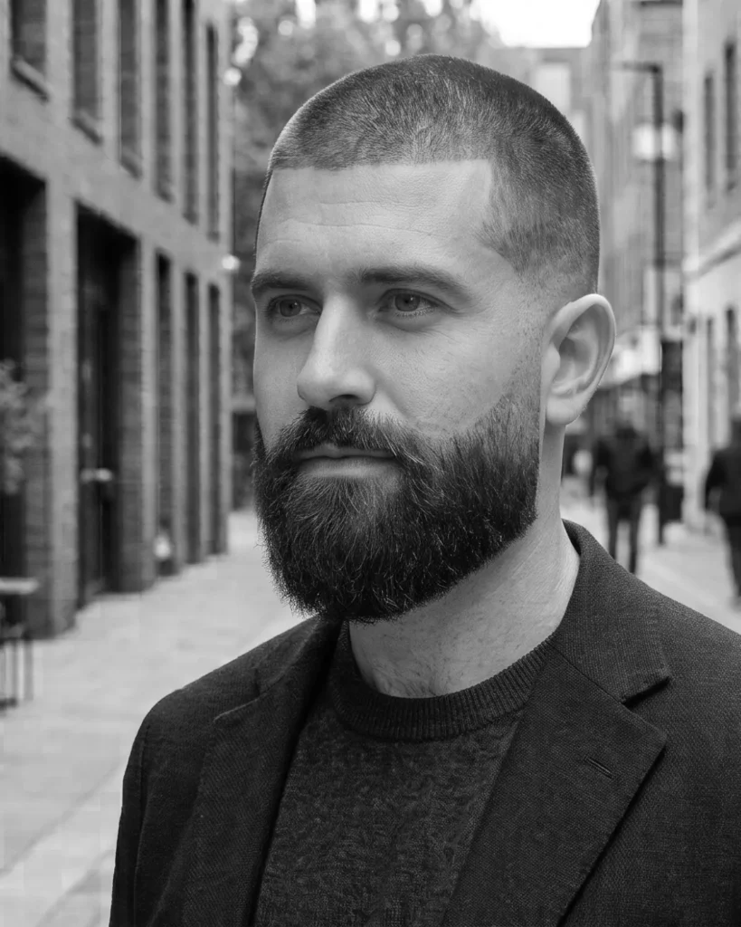 medium tapered beard style with length decreasing toward the ears