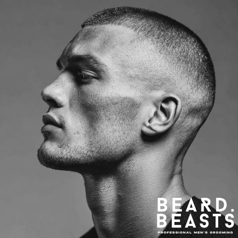 Men's buzz cut fade haircut with a clean, sharp fade on the sides and a short, even cut on top. Ideal for a low-maintenance, bold, and masculine look.