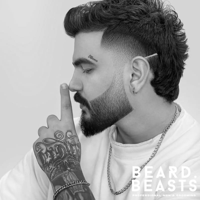 Men's temple fade haircut featuring a clean fade around the temples with sharp, defined edges, paired with textured hair on top. Ideal for a sleek, structured style with a modern edge.