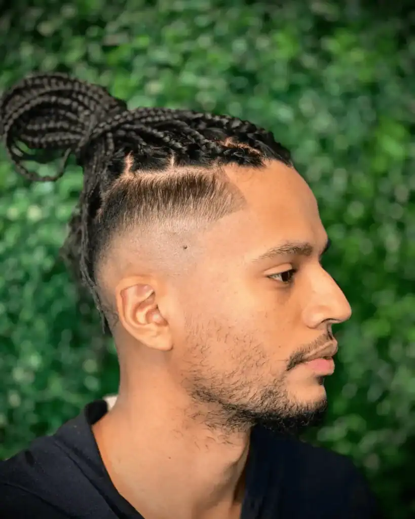 High fade with braids hairstyle for men