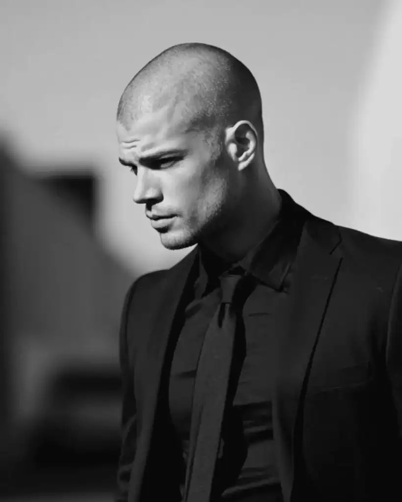 Number 1 Buzz Cut styled with a formal suit for a professional corporate look