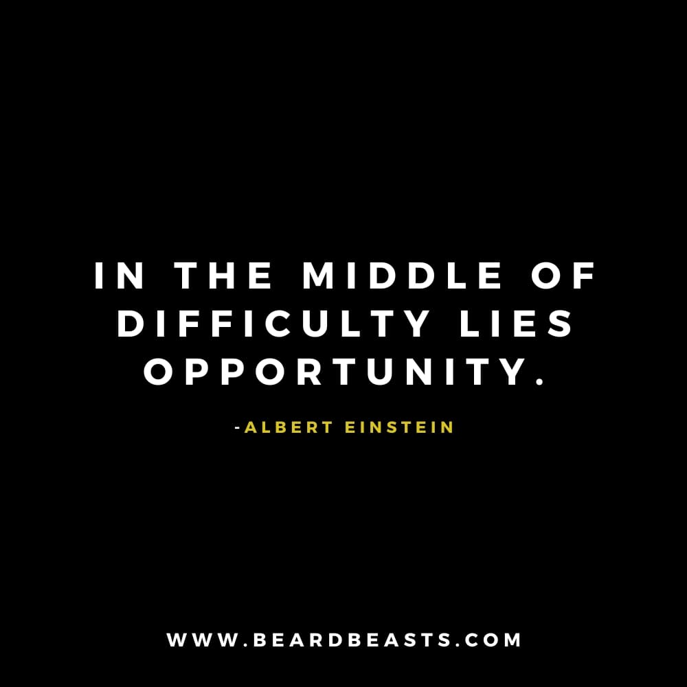 The image features an inspirational quote from Albert Einstein on a black background. The text, in bold white font, reads: "In the middle of difficulty lies opportunity." Below the quote, Albert Einstein's name is written in small yellow font. At the bottom, the website "www.beardbeasts.com" is displayed in white text. This design highlights a motivational man to man quote about resilience, emphasizing the potential for growth and success even during challenging times.