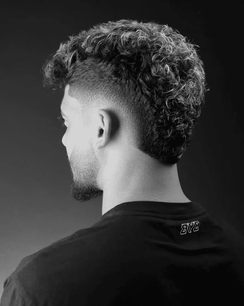 Curly Burst Fade Mohawk
