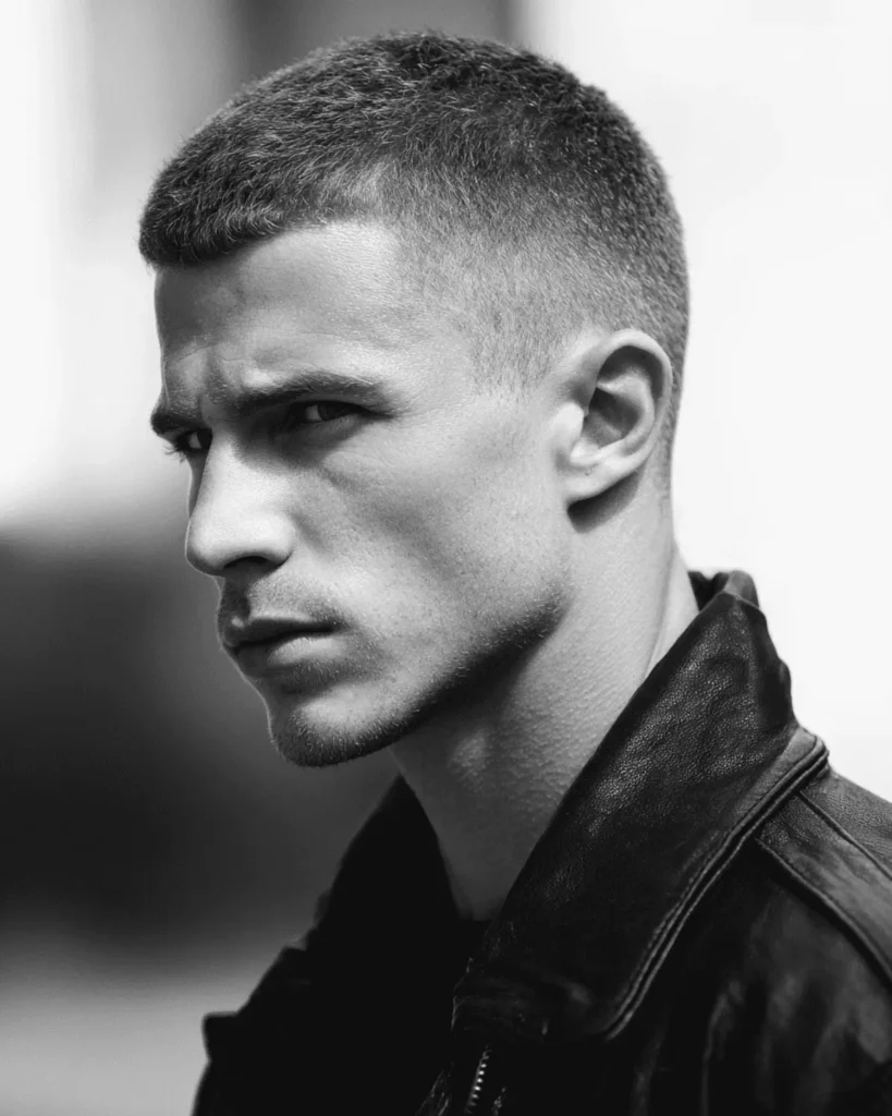 Classic crew cut hairstyle for men with short sides and slightly longer top