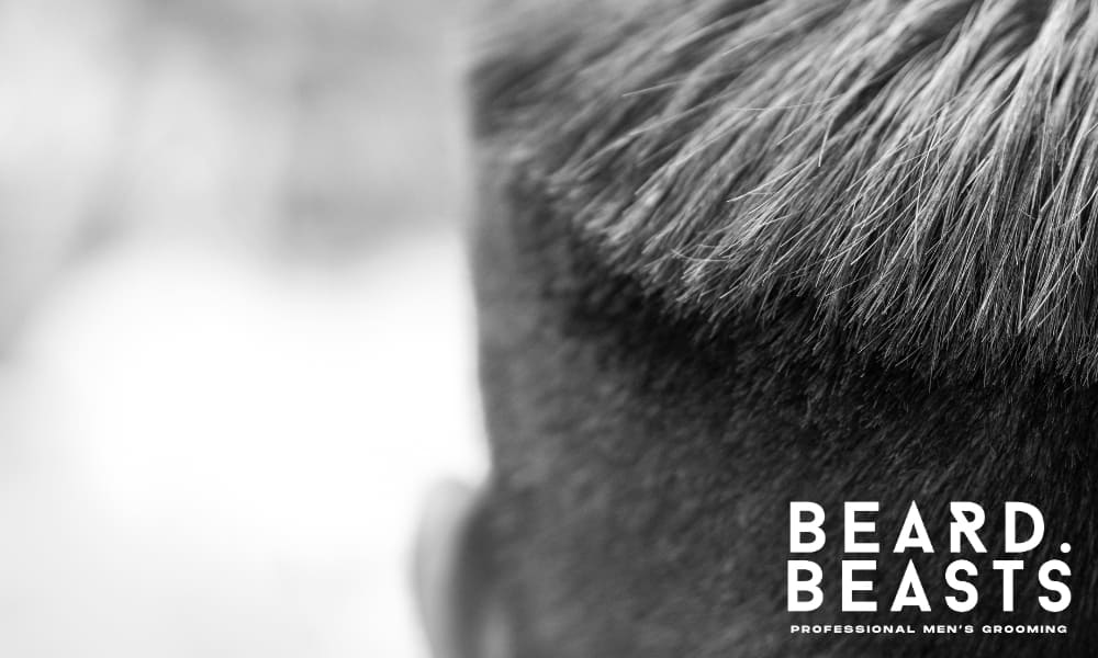 Close-up of a textured men's hairstyle highlighting fine hair detail, featured by Beard Beasts professional men's grooming brand.