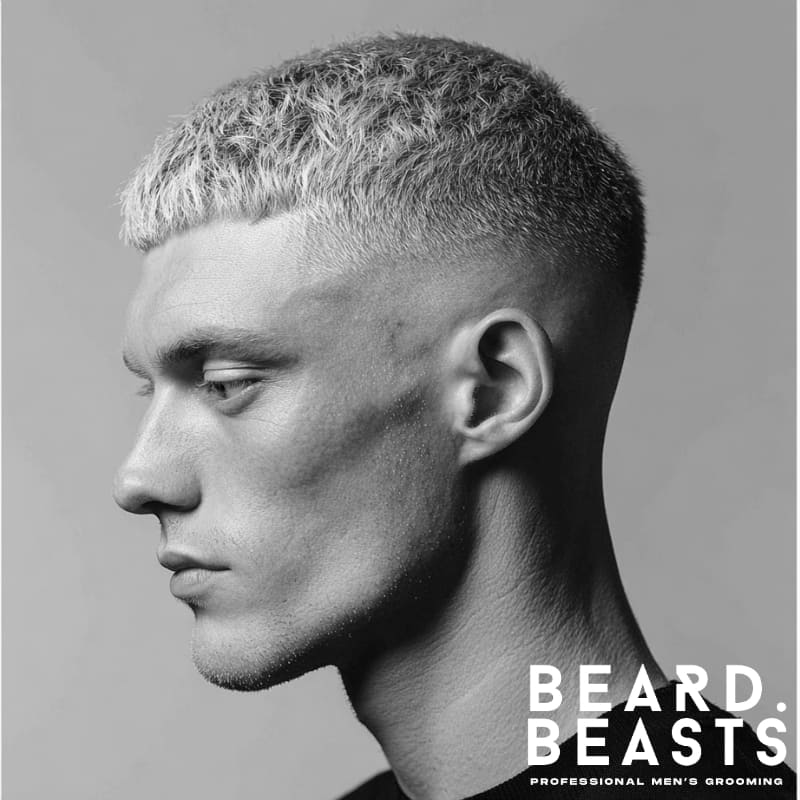 High fade French crop with a short fringe, featuring a clean fade on the sides and a sharp, structured top. Ideal for men seeking a bold, modern look with minimal upkeep.