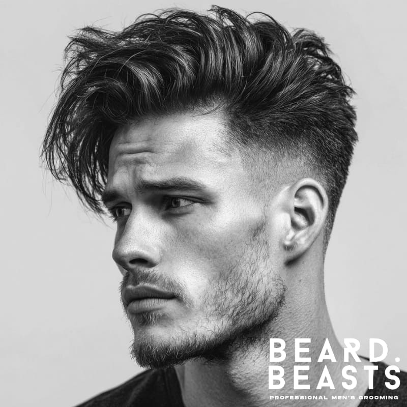 Young male model with a textured side-swept haircut for men, featuring natural volume and movement for a modern, effortless look.