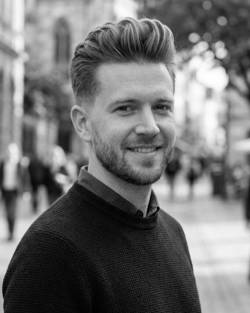 Man with fine hair styled with sea salt spray for added volume, texture, and fuller-looking shape.