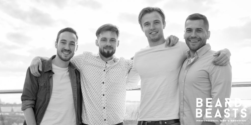 Group of four men with different face shapes and hairstyles, showcasing how to choose the perfect haircut for your face shape. The image features a variety of styles, from classic to modern cuts, highlighting the versatility of men's grooming.