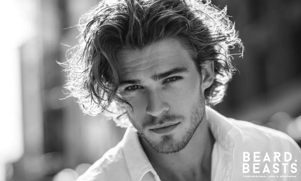 Medium-length beach waves hairstyle styled using sea salt spray for natural texture and movement