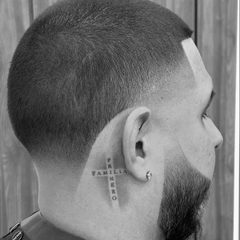 Buzz cut with fade and beard for men with small heads, featuring a clean taper, sharp line-up, and balanced facial hair for added structure.