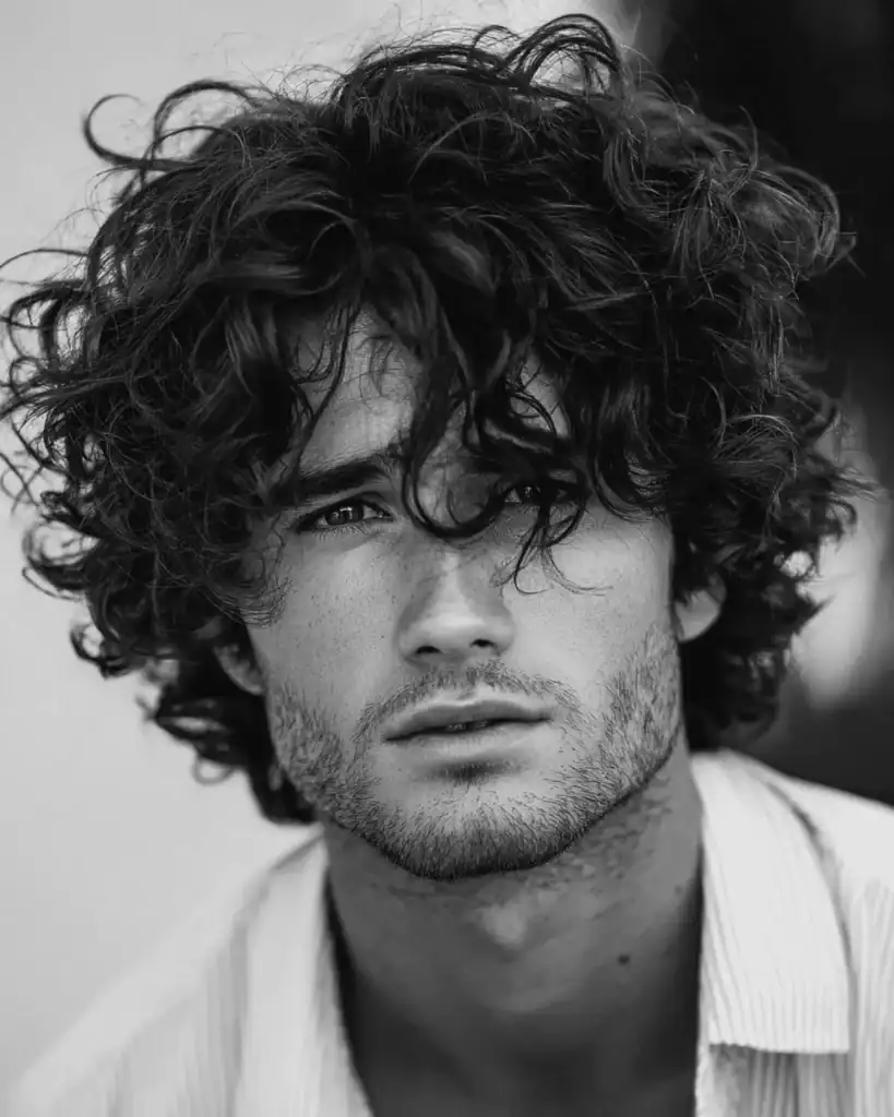 curly medium length haircut for men