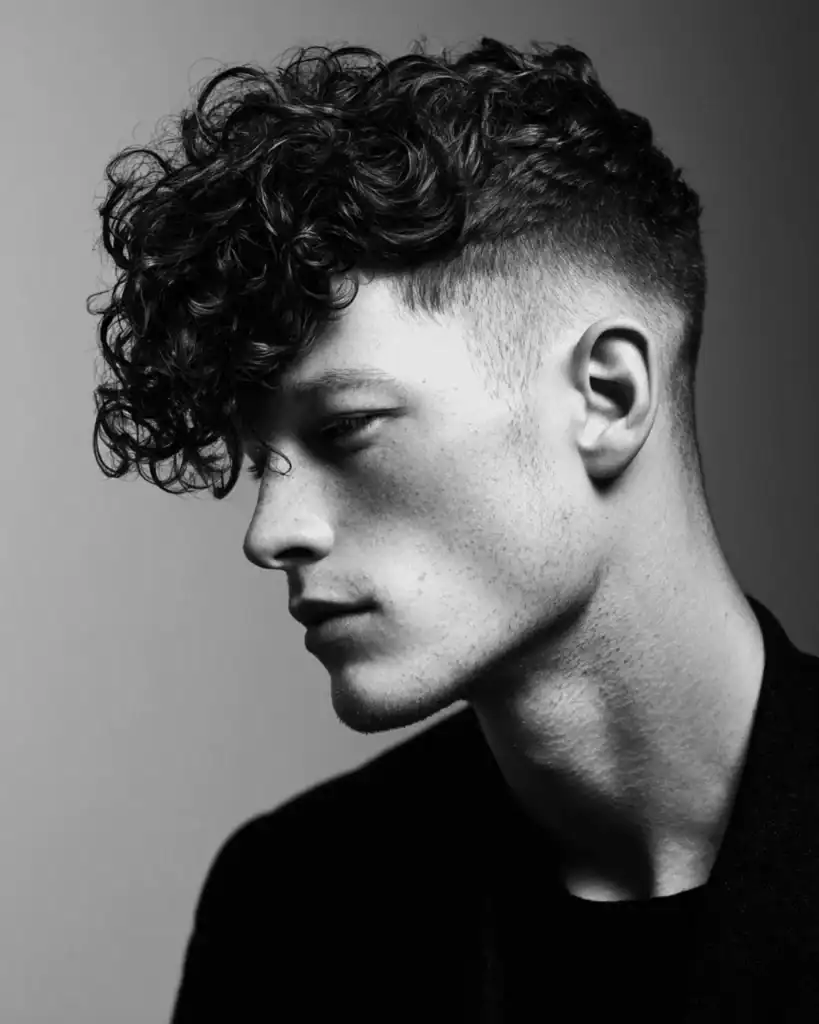 undercut with a curly textured fringe