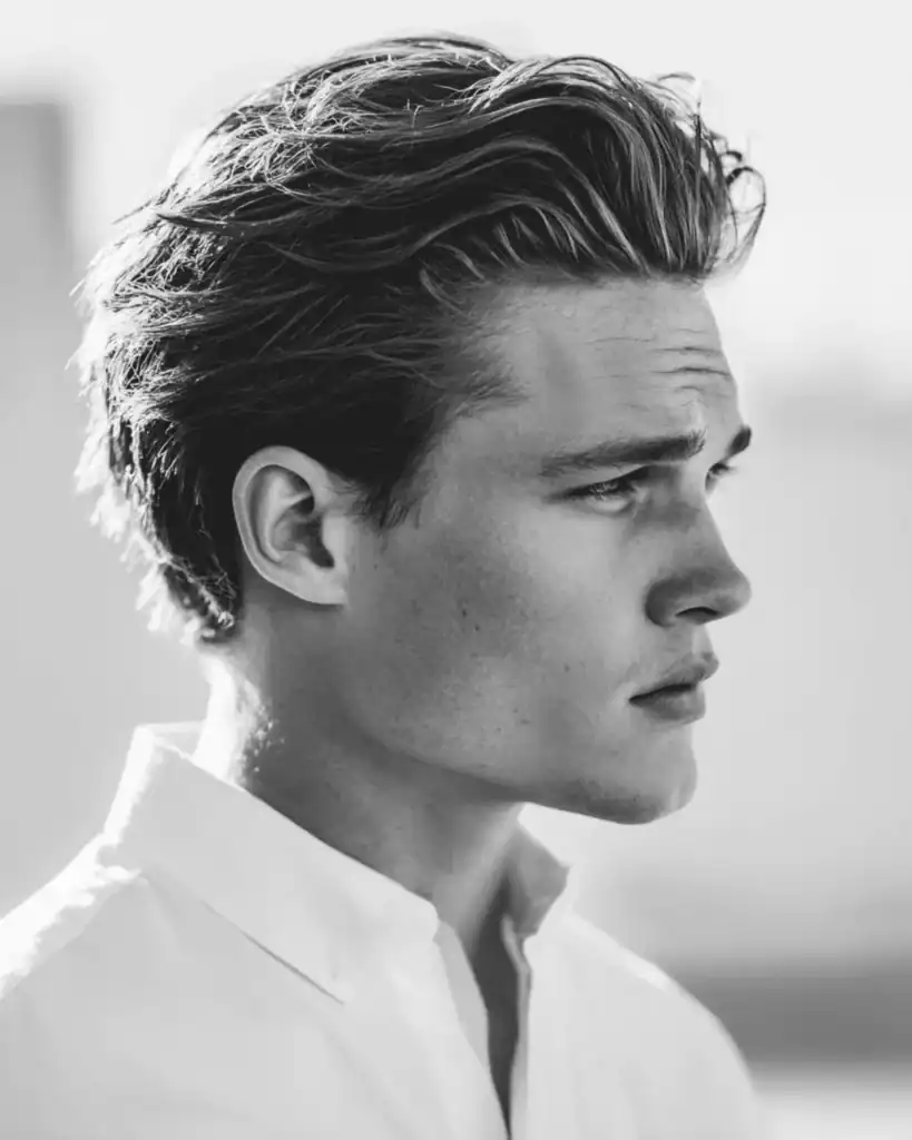 medium length textured slick back haircut