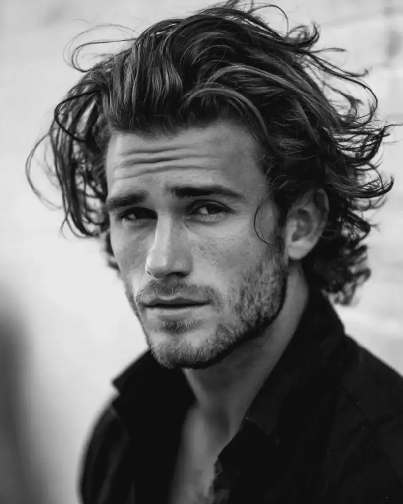 wavy brush back haircut for men
