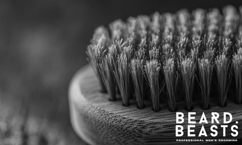 Boar bristle beard brush used to help get your beard to lay flat and stay controlled
