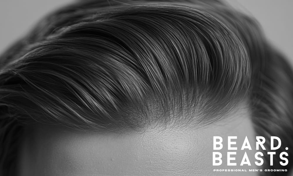 Close-up of a man’s scalp and well-groomed hair, highlighting the importance of scalp care and overall hair health for effective styling.
