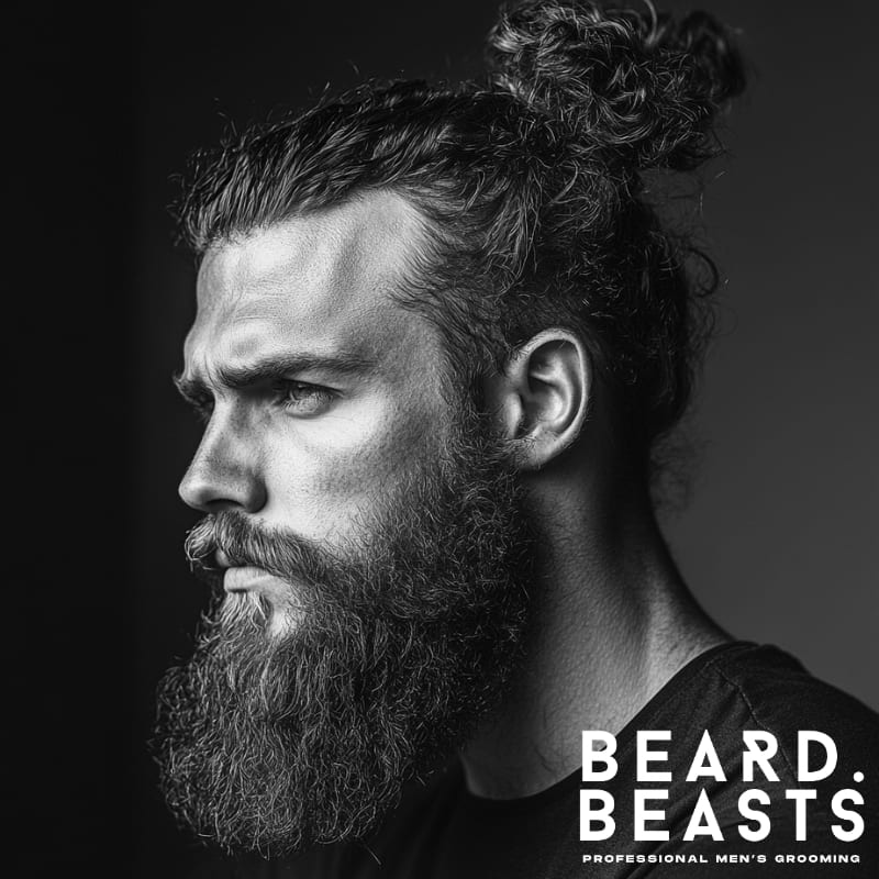 Side profile of a man with a curly man bun and thick full beard, showcasing natural texture and defined grooming—ideal for a bold, rugged man bun and beard look.