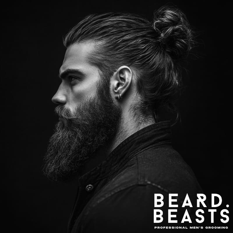 Profile of a man with a classic man bun and a full, dense beard—projecting sharp structure and confident grooming control.