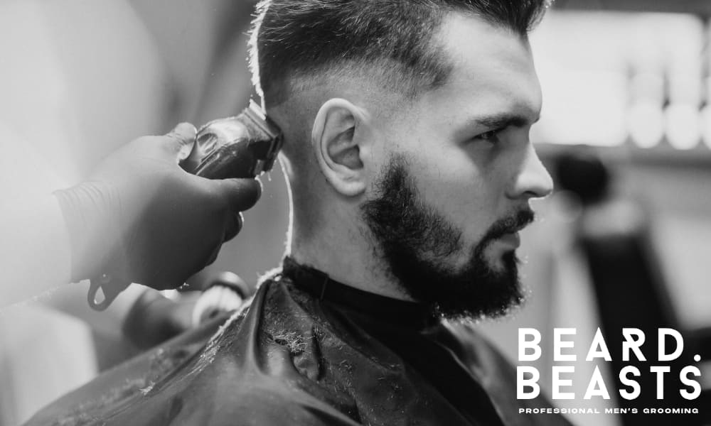 Close-up of a barber trimming a client's hair in a salon, focusing on the clean fade and precise details. Professional grooming in progress.