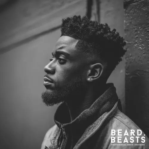 A stylish high-top fade haircut for Black men, featuring a sharply defined, voluminous top with a smooth skin fade on the sides. The crisp lineup and well-groomed beard add to the clean, polished look, making this fade haircut a bold yet classic choice for men who want a fresh and modern style. Beard Beasts branding reinforces professional men's grooming.