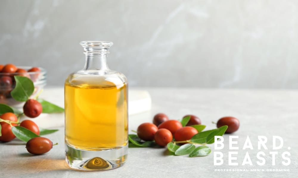 Jojoba oil and seeds—popular oil for clipper maintenance on sensitive skin