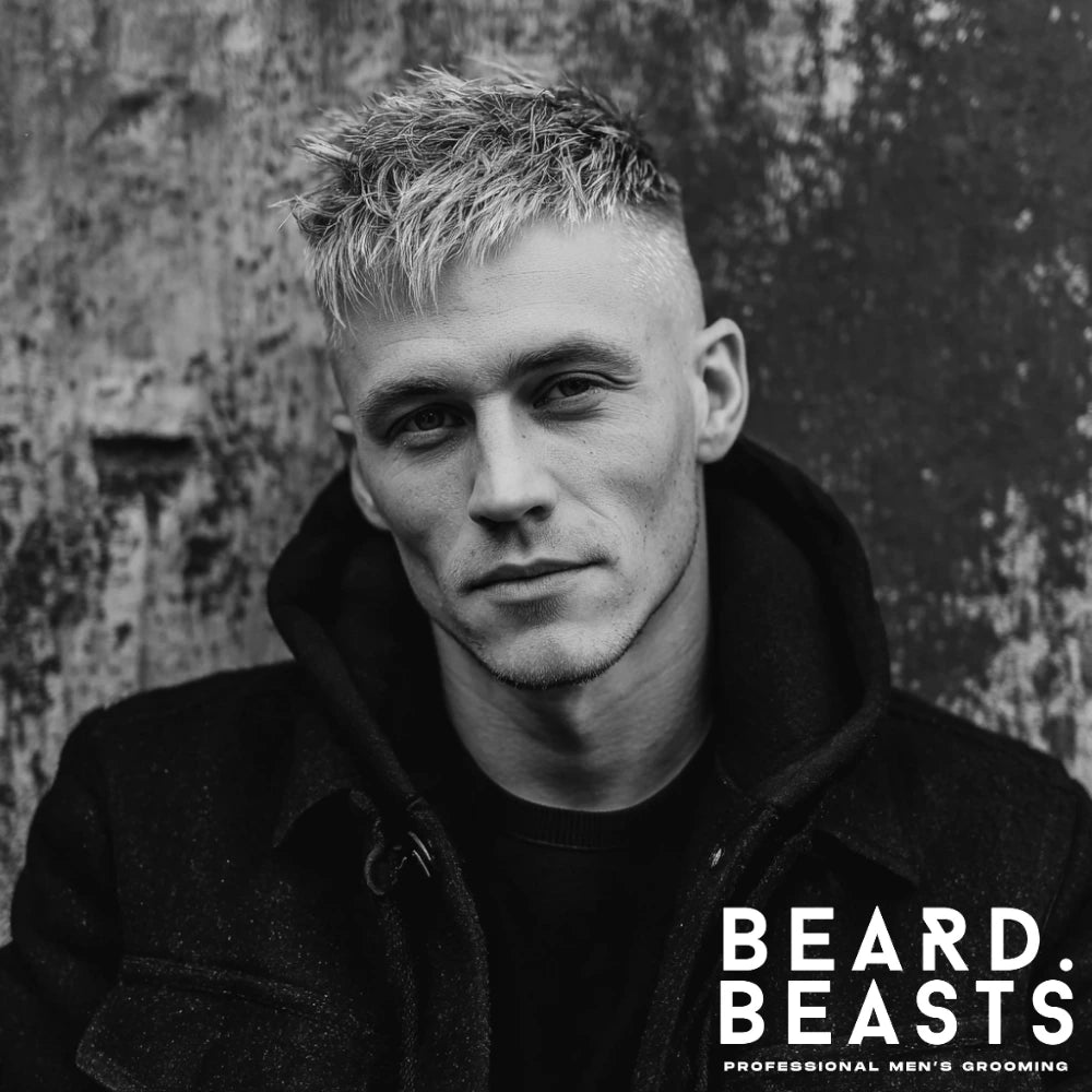 A long layered crew cut with a high fade, a modern style among layered haircuts for men. The hair on top is textured and longer than a traditional crew cut.