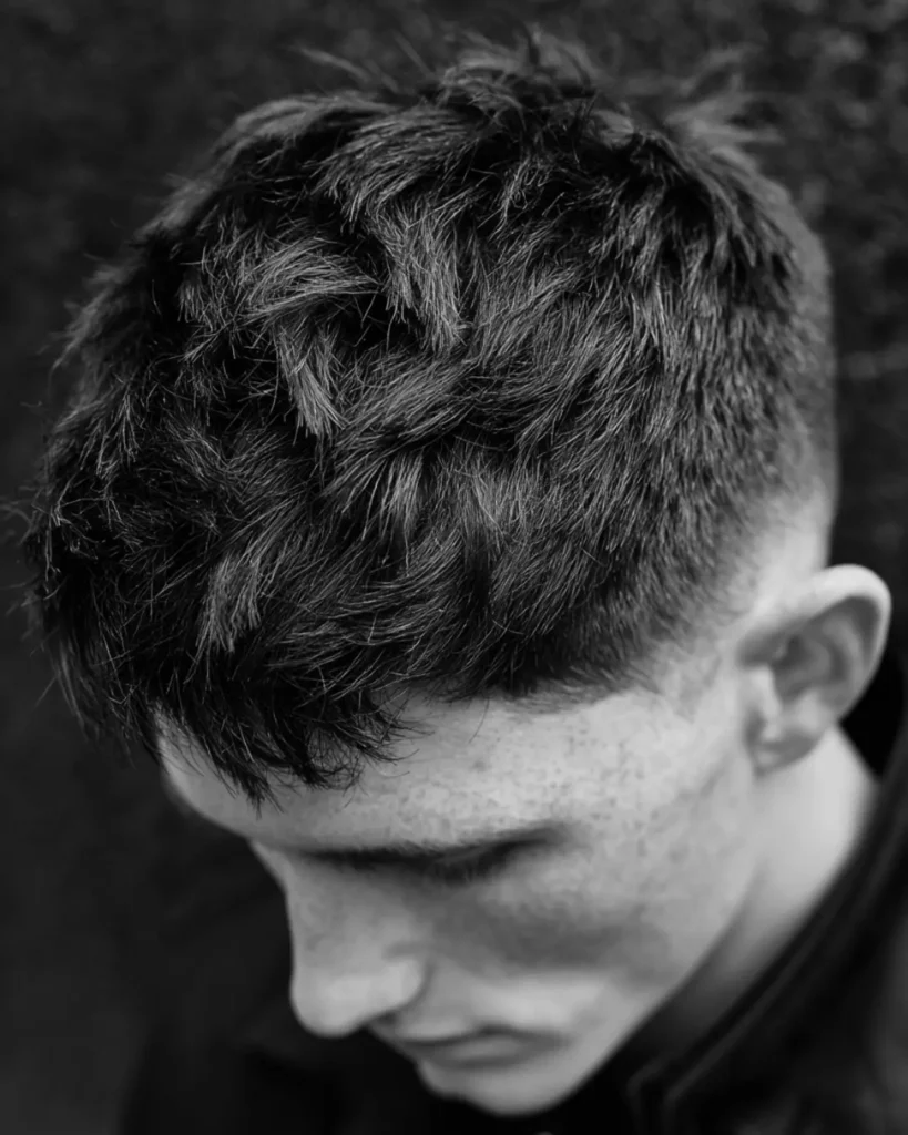 Close-up of textured men’s hair, showing how hair paste can add movement and flexible hold for everyday styling.